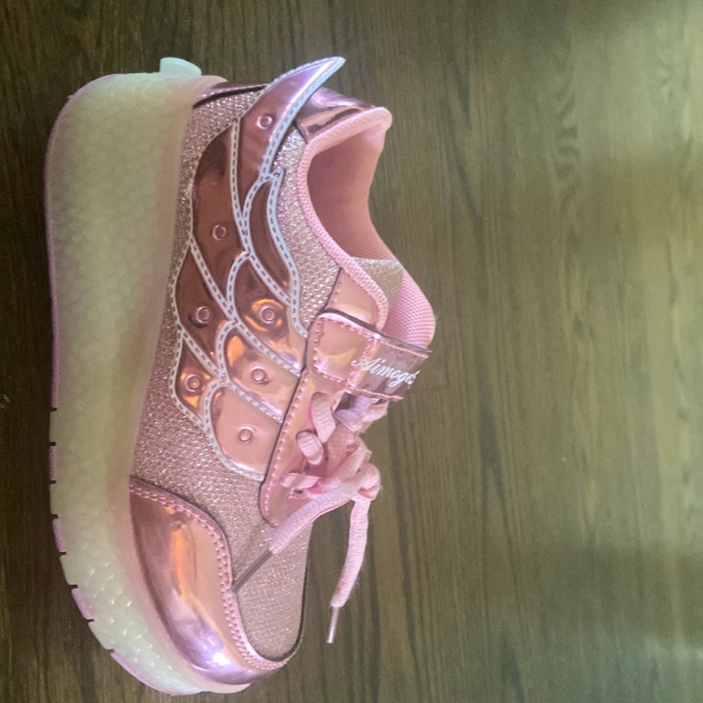 Pair Pink light up heelys comes with charger